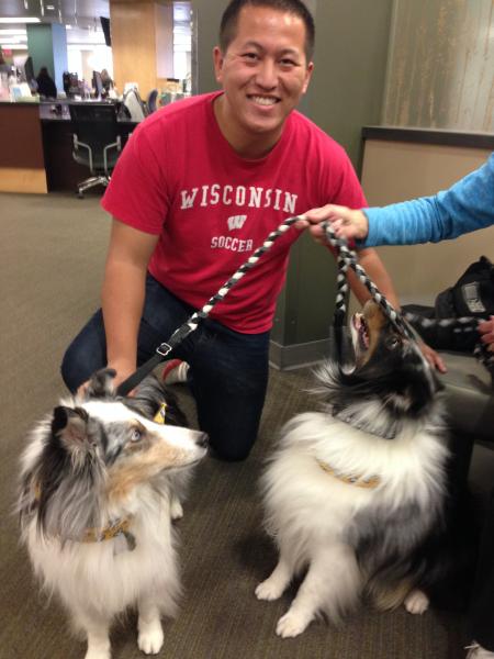 Therapy dogs visit the library. Image provided by Vince Mussehl. CVTC.